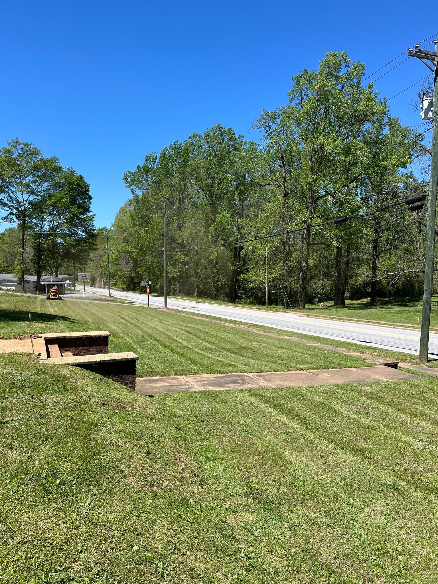 Landscape rebuild in progress with grading and patio outline